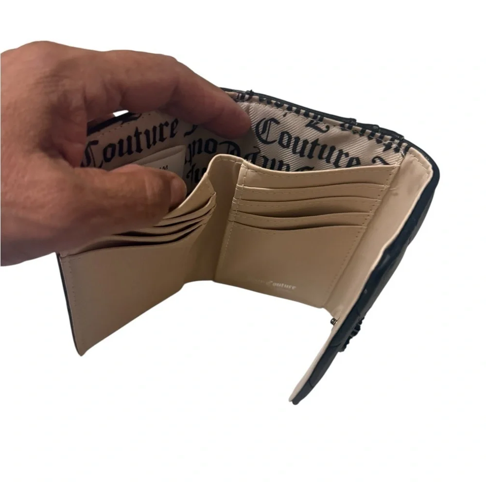 Juicy Couture Black Quilted Wallet in new condition comes with kay chain holder